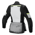 Alpinestars Stella Andes Air Drystar® Jacket, Women's Motorcycle Touring Jacket, Rear view, Ice Gray Dark Gray and Black, featuring a large white mesh back panel, grey rear storage pouch with logo, yellow hi-viz accents, and textile construction for airflow and protection.