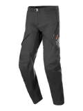 Alpinestars AMT-8 Stretch Drystar XF Pants, Black motorcycle touring pants, featuring zippered thigh ventilation ports, orange star logo branding, adjustable waist buckle, and reinforced knee panels, durable stretch performance fabric
