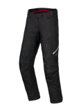 Alpinestars Honda ST-1 Waterproof Pants, Motorcycle Touring Pants, Black with red interior detail, zippered cargo pockets on thighs, ergonomic pre-curved legs with reinforced knees, textile waterproof adventure gear