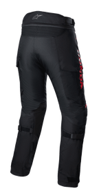 Alpinestars Honda Bogota' Pro Drystar® Hose, Adventure-Motorradtourenhose, Schwarz mit rotem HONDA-Branding, Rückansicht mit Akkordeon-Stretcheinsätzen an der Taille, verstellbaren Riemen an den Waden und strapazierfähiger Textilkonstruktion für Ganzjahres-Adventure-Touren.