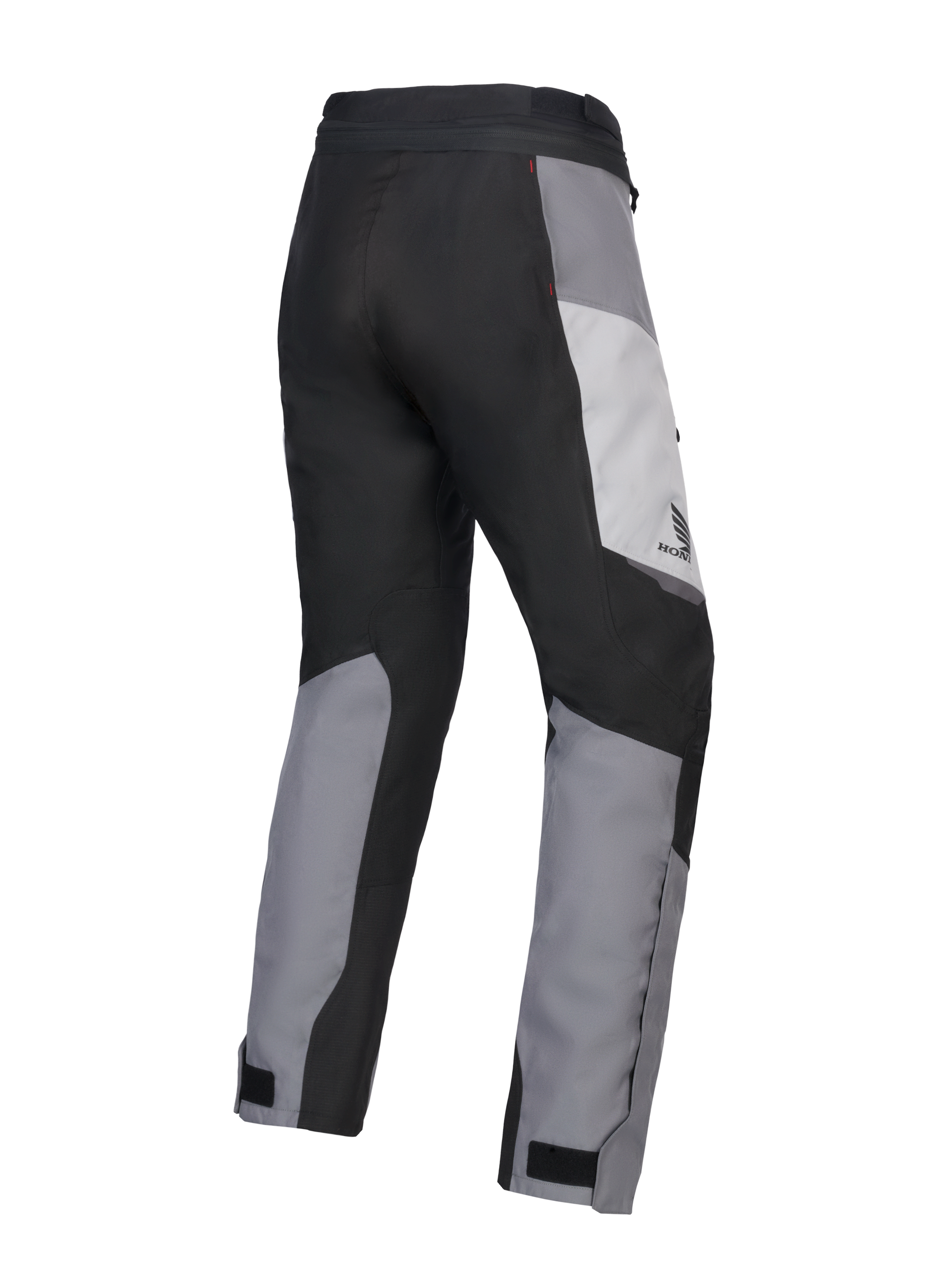 Alpinestars 2025 Honda Stella ST-1 Waterproof Damen-Motorradhose, Damen-Motorrad-Touringhose, Ice Gray, Dunkelgrau und Schwarz, Rückansicht in Dreiviertel-Perspektive zeigt strapazierfähige Textilkonstruktion, grau und schwarz farblich abgesetzte Paneele, Honda-Branding an der Hüfte und verstellbare Knöchelverschlüsse.