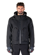 Alpinestars Morush Waterproof Parka, black men's urban motorcycle jacket with a hood and large zippered pockets.