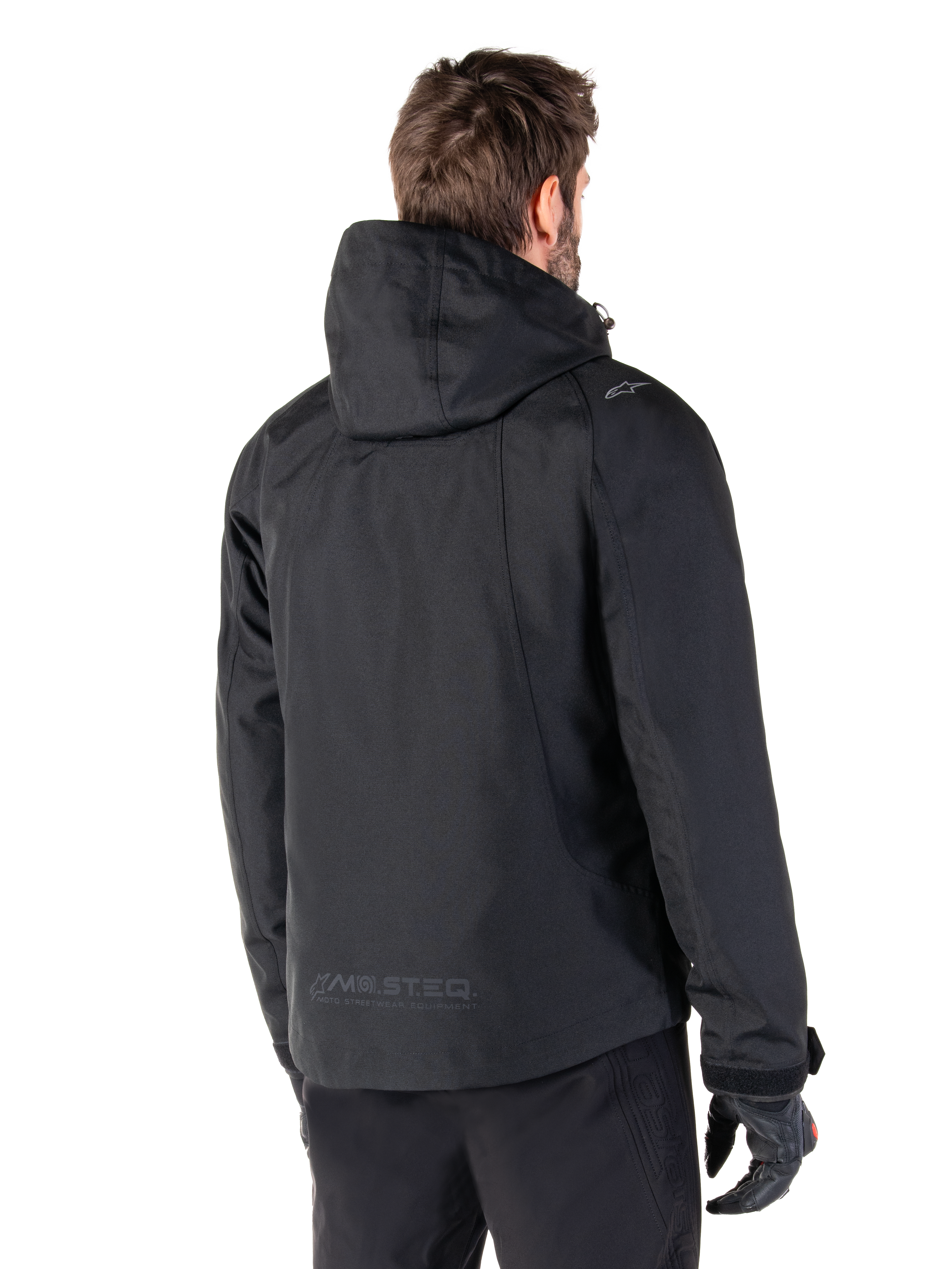 Alpinestars Morush Waterproof Parka, Black Men's Urban Motorcycle Jacket, hooded rear view with MO.ST.EQ. branding.