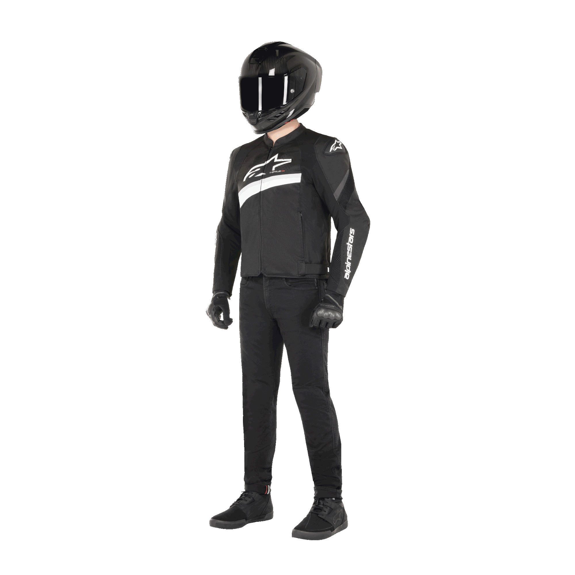 Rider wearing Alpinestars T-GP Plus R V4 Airflow Jacket in Black and White, textile motorcycle jacket with mesh panels and white Alpinestars branding, paired with a black helmet, black riding gloves, black pants, and black shoes