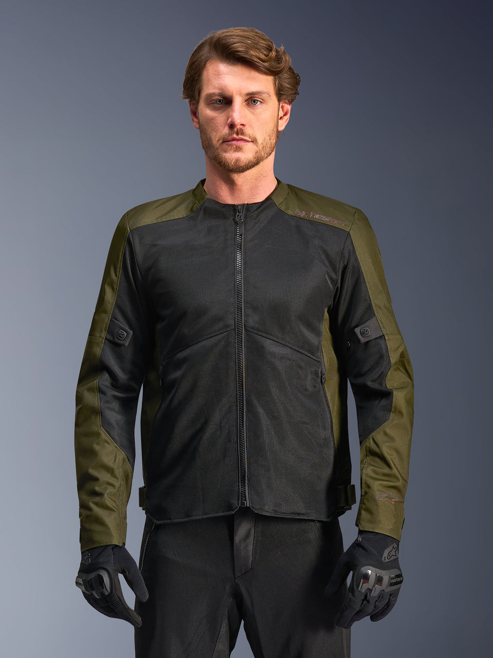Alpinestars C-1 Air Jacket, Khaki and Black, men's motorcycle jacket with large tech mesh panels for maximum airflow, worn by a model with black riding pants and gloves, urban contemporary design for commuting.