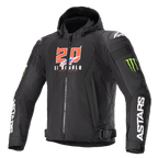 Alpinestars FQ20 Zaca Air Monster Jacke, schwarze Textil-Motorradjacke mit Kapuze, rot-weiße „20 El Diablo“-Grafiken, grüne Monster Energy Krallen-Logos, weißes ASTARS-Branding auf den Ärmeln, DFS Lite Schulterschleifer, Reißverschluss