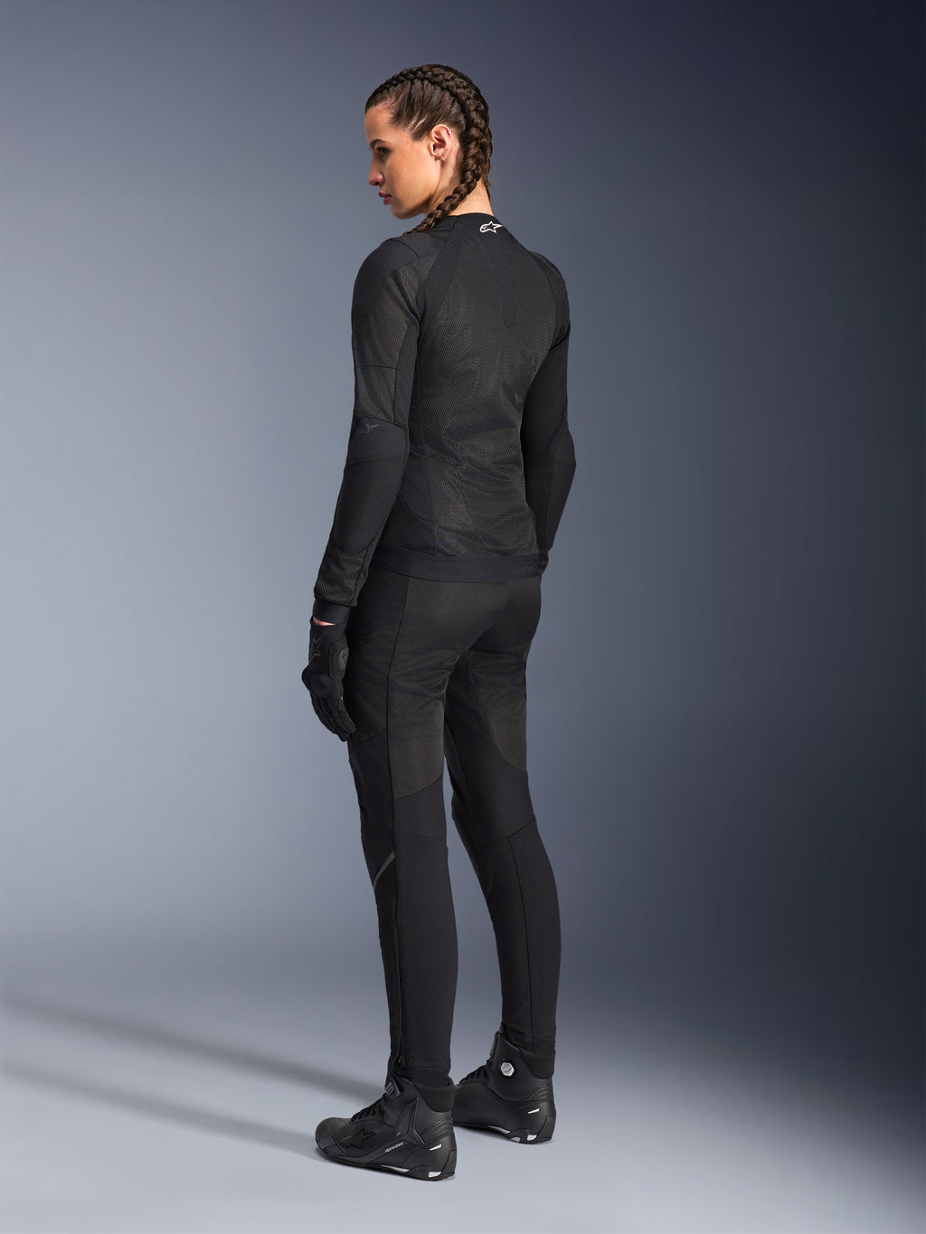 Alpinestars Woman Stella Troop-Air Jacket, Black, back view, worn with matching black motorcycle pants, gloves, and boots, slim-fit technical mesh construction for urban riding