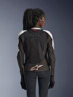 Alpinestars Stella SMX Air Jacket, Women's Motorcycle Jacket, Ice Gray and Black with Coral Fluo accents, back view showing Tech-Air Ready branding and white Astar logo, mesh chassis for high ventilation, sport-style fit