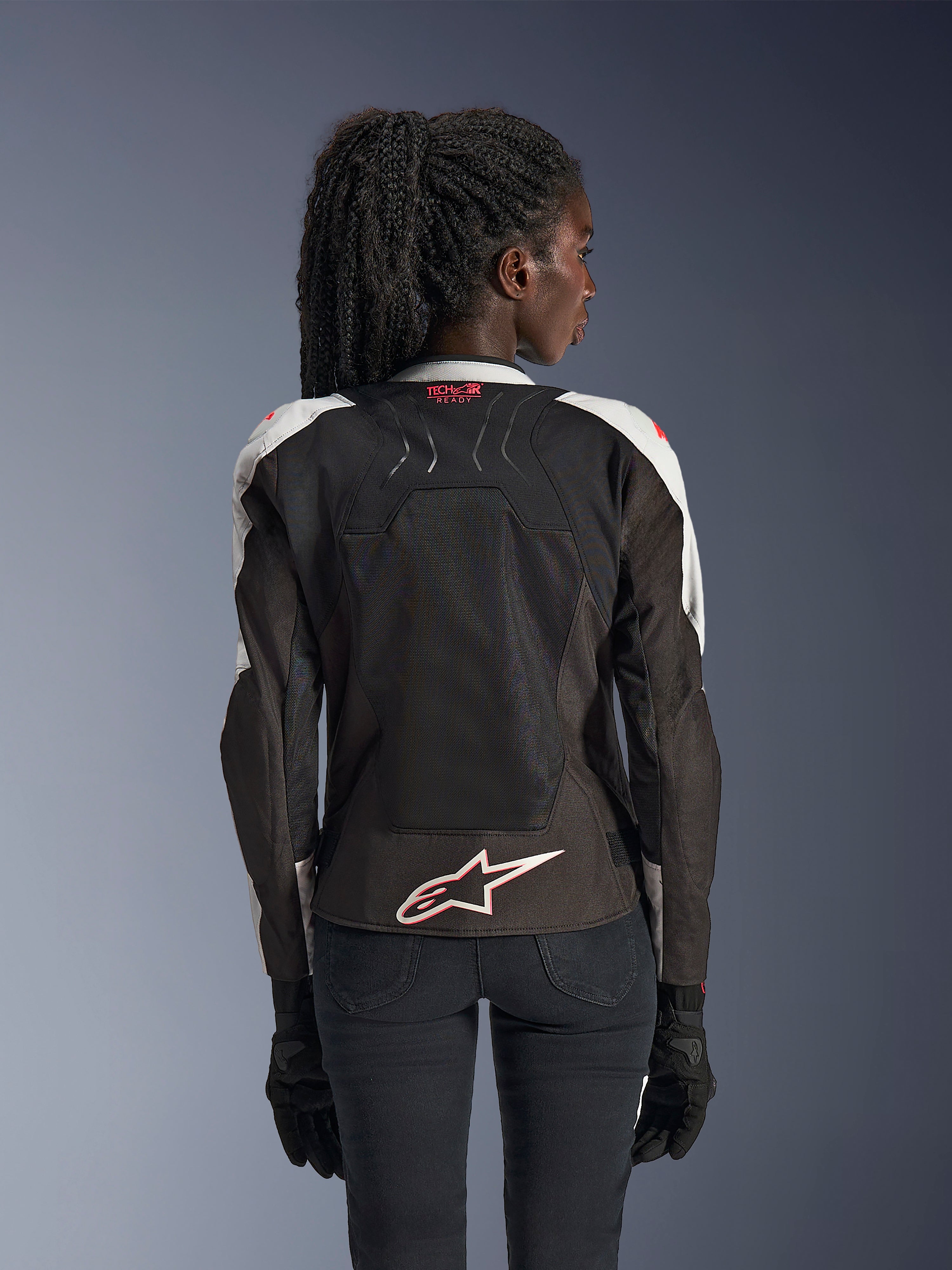 Alpinestars Stella SMX Air Jacket, Women's Motorcycle Jacket, Ice Gray and Black with Coral Fluo accents, back view showing Tech-Air Ready branding and white Astar logo, mesh chassis for high ventilation, sport-style fit