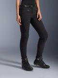 Alpinestars Alamosa Women Pants, Black Urban Motorcycle Pants, slim-fit design with zippered pockets and integrated waist belt, paired with black high-top riding shoes