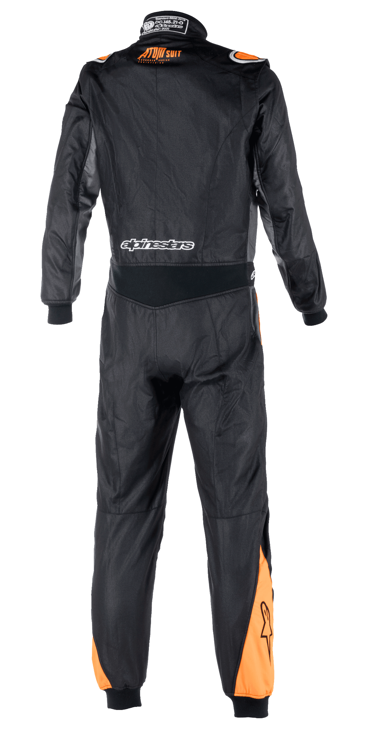 Alpinestars Atom FIA Graphic Suit, back view of a one-piece auto racing suit, Black and Anthracite with Orange Fluo accents on shoulders and calves, featuring FIA certification details on the collar and Alpinestars branding across the lower back.