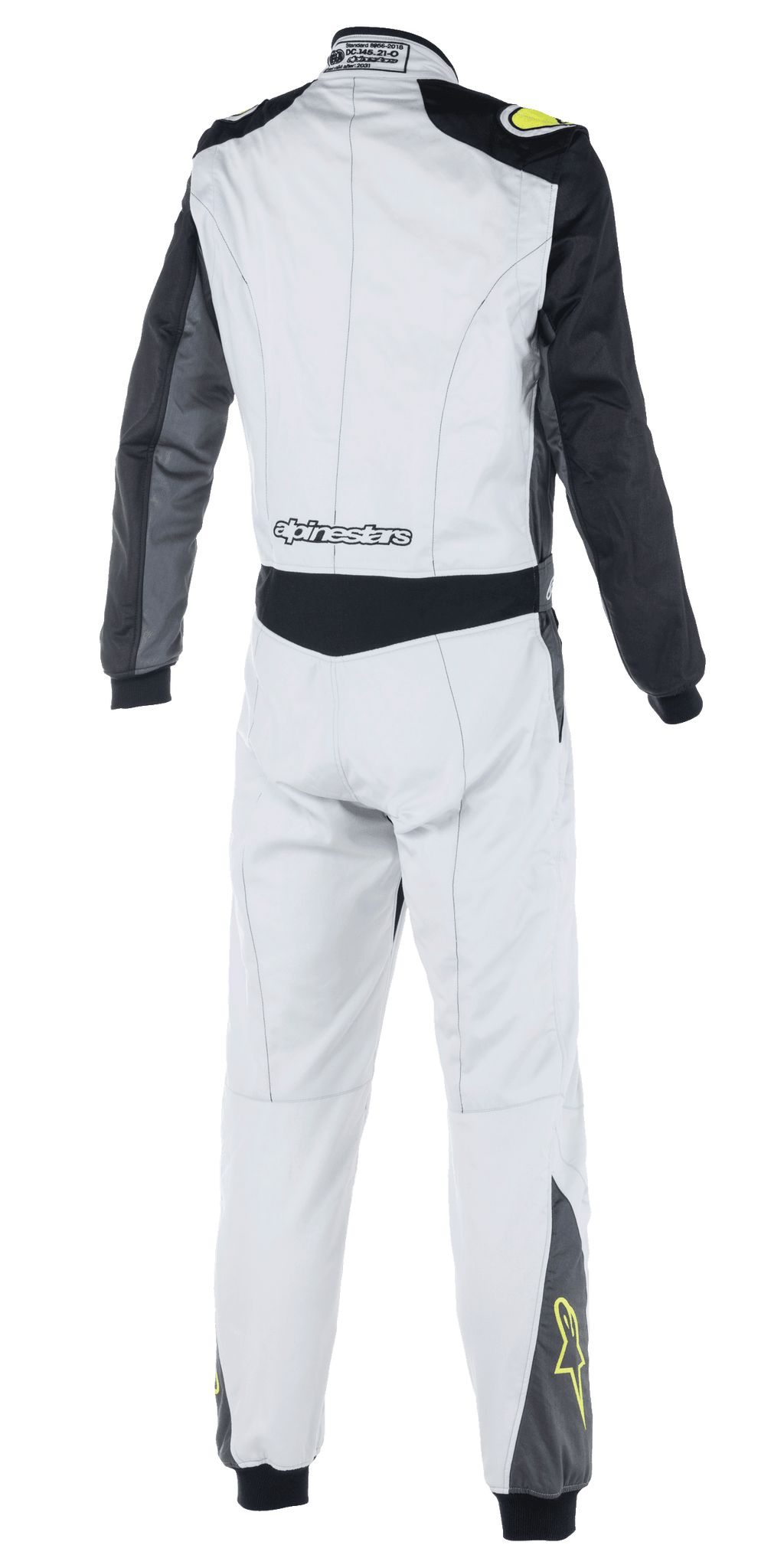 Alpinestars Atom FIA Anzug, Automobil-Rennkombi, Silber, Anthrazit und Gelb Fluo, Rückansicht mit schwarzen Ärmeln und Taillenpaneel, Alpinestars-Branding am unteren Rücken, gelbe Stern-Logos an den Unterschenkeln, FIA-zertifizierte Motorsportbekleidung