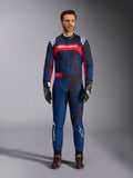 Alpinestars KMX-9 V3 Graphic 5 Suit, Karting Suit in Navy and Red, featuring an abstract camo-style graphic pattern, worn by a model with black racing gloves and shoes, athletic design with prominent Alpinestars branding on the chest and legs.