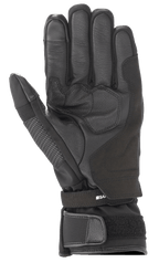 Alpinestars Andes V3 Drystar® Handschuh, schwarzer Motorradhandschuh, Handflächenansicht mit Ziegenleder- und Textilkonstruktion, verstärkter Handflächenbereich, verstellbarer Handgelenksriemen mit Klettverschluss, technisches Allwetter-Touring-Design