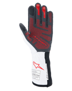 Alpinestars Tech-1 ZX V4 Gloves, Auto Racing Gloves, Black White and Red, palm view featuring a red 3D silicone grip pattern, white gauntlet cuff with red Alpinestars logo and FIA and SFI certification labels