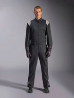 Alpinestars Kart Indoor V2 Suit, One-piece Karting Suit, Black, featuring white Astars logos on the shoulders and lower legs, adjustable waist belt and ergonomic collar, designed for recreational indoor karting