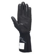 Alpinestars Tech-1 KX V4 Gloves, Karting Gloves, Black, palm view featuring 3D silicone grip patterning, external seams, and ribbed cuff with gray Astars logo, professional motorsport racing gear
