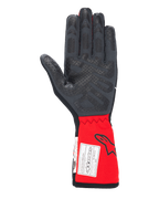 Alpinestars Tech-1 Race V4 Gloves, Auto Racing Gloves, Black and Red, palm view highlighting silicone grip patterns on fingers and palm, extended red cuff featuring Alpinestars logo and FIA certification label, high-performance motorsport gear