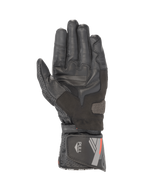 Alpinestars SP-8 V3 black leather motorcycle gloves, palm view with grip reinforcements and secure hook and loop cuff closure.