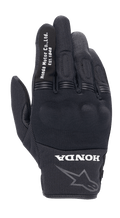 Alpinestars Honda Copper Handschuh, Schwarzer Urban-Motorradhandschuh, Strukturierte Mesh-Konstruktion, Weißer „Honda Motor Co. Ltd. Est. 1948“-Schriftzug auf dem Zeigefinger, „HONDA“-Logo und Alpinestars-Stern-Umriss am Handgelenk, Harter Knöchelschutz, Leichte Ausrüstung für Straßenfahrten