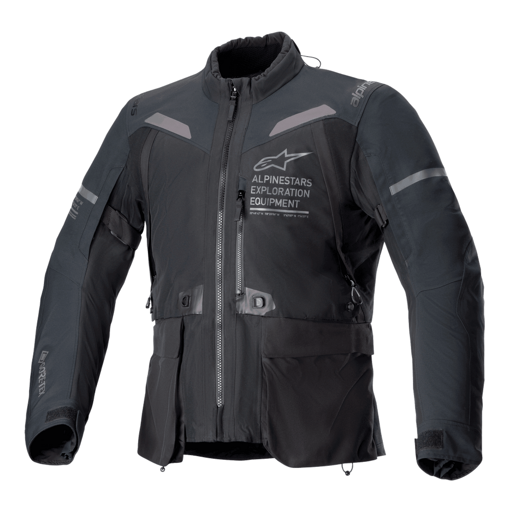 Alpinestars ST-7 2L GORE-TEX Jacket, Black and Dark Gray motorcycle jacket, front view featuring large cargo pockets, reflective shoulder accents, and Alpinestars Exploration Equipment logo on the chest, waterproof adventure touring gear
