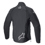 Alpinestars Techdura Jacke, Black Reflex, Rückansicht einer Offroad-Motorradjacke aus Textil, mit reflektierenden Alpinestars-Logos am unteren Rücken und im Nacken, robustes Design für Enduro- und Adventure-Fahrten