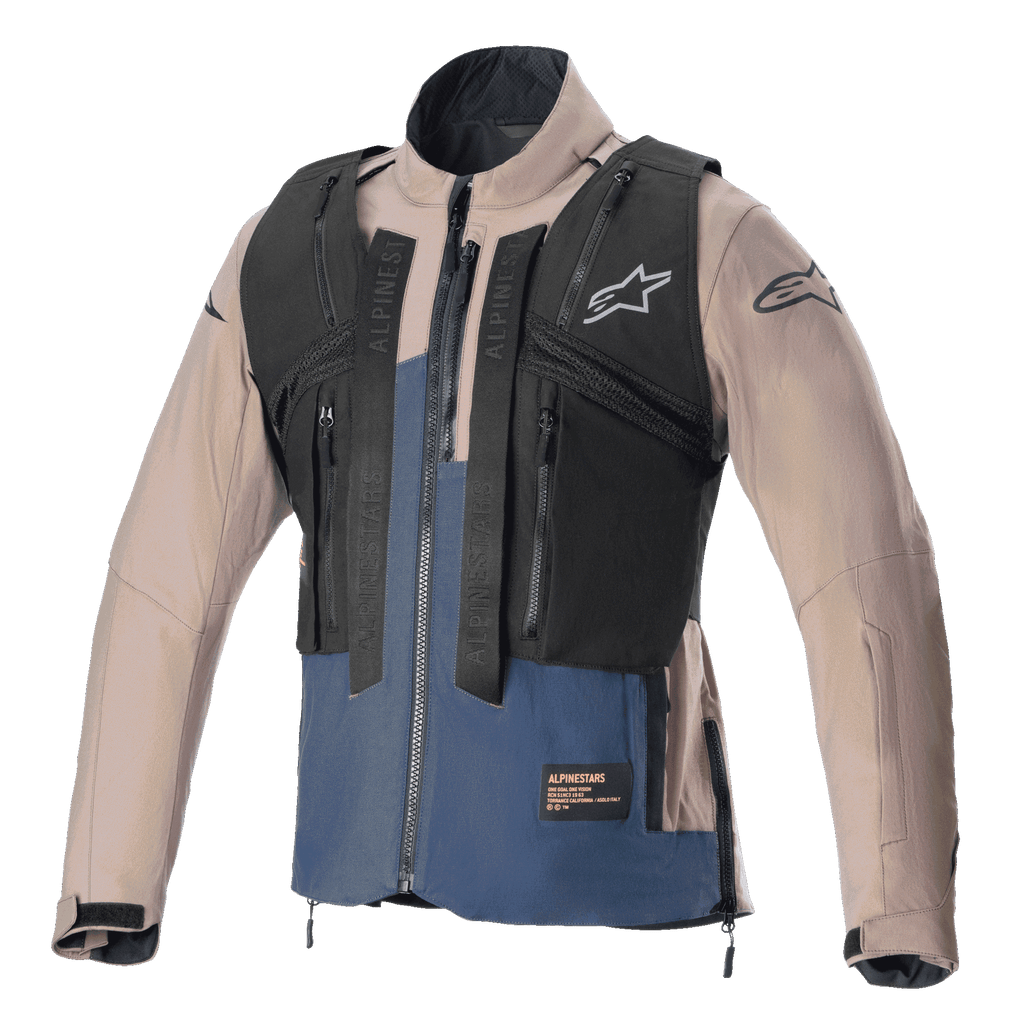 Alpinestars Techdura Jacke, Falcon Brown und Night Navy, mit abnehmbarer schwarzer taktischer Weste mit mehreren Reißverschlusstaschen, robuste Stretch-Polyamid-Konstruktion, Stern-Logo auf der Brust und den Ärmeln, konzipiert für Enduro- und Offroad-Fahrten.