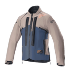 Alpinestars Techdura Jacke, Offroad-Motorradjacke, Falcon Brown und Night Navy, Vorderansicht, zweifarbige Konstruktion mit vertikalem schwarzem Alpinestars-Branding, orangem Schulter-Logo, hohem Kragen und Front-Reißverschluss, technische Bekleidung für Enduro- und Adventure-Fahrten.