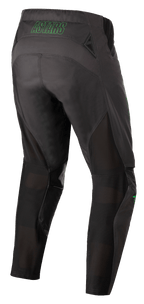 Alpinestars Techstar Phantom Hose, Motocross-Hose, Anthrazit und Neongrün, Rückansicht mit neongrünem „ASTARS“-Branding am Bund, Mesh-Belüftungseinsätzen an der Beinrückseite und verstärktem Gesäßbereich für Strapazierfähigkeit im Offroad-Rennsport