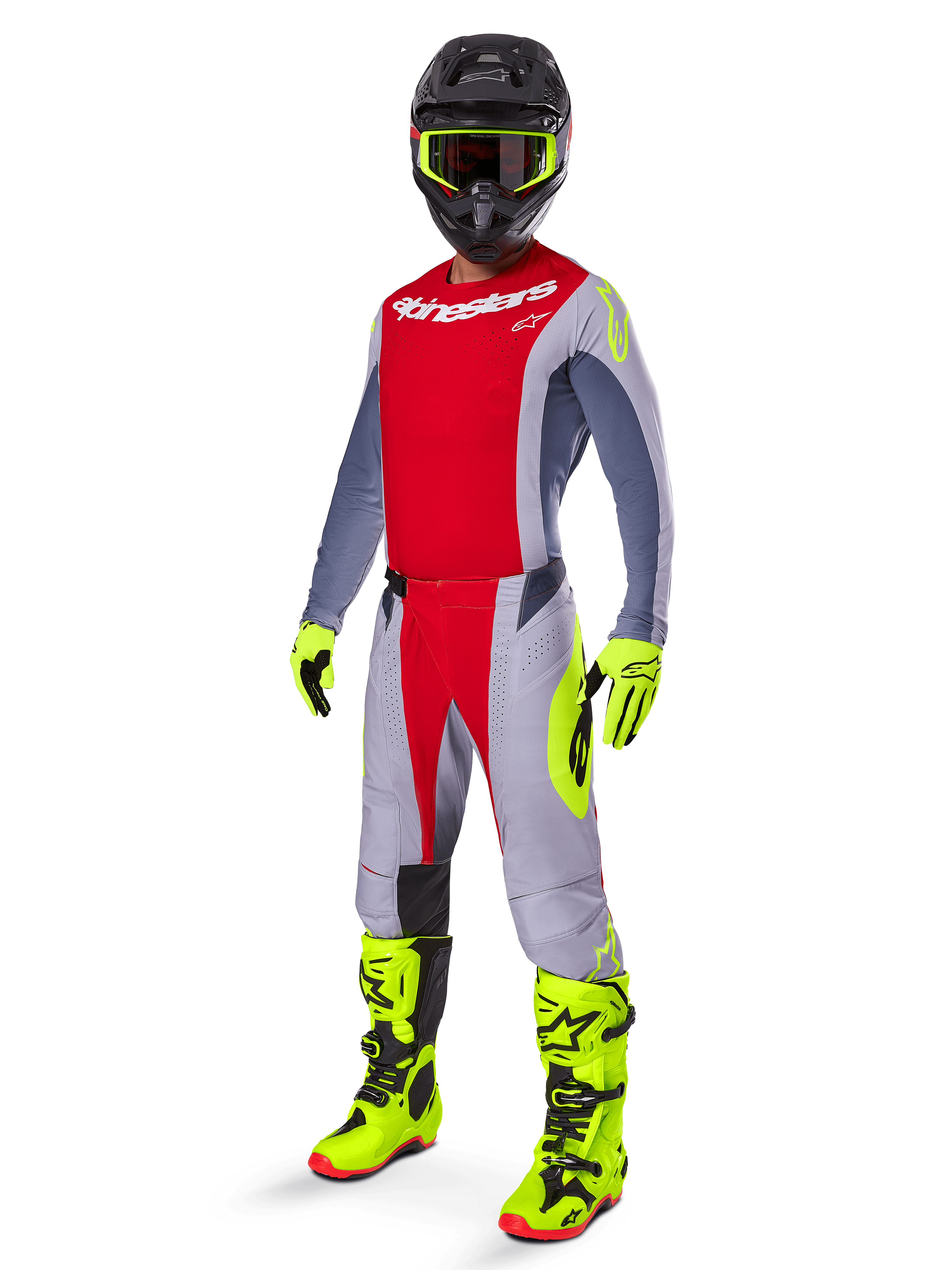 Motocross-Fahrer in kompletter Rennausrüstung, rotes und graues Trikot mit Alpinestars-Branding, 2025 Techstar Melt Hose in Hellrot und Grau mit neon-gelben Akzenten, leuchtend gelbe Stiefel und Handschuhe, schwarzer Helm mit neon-gelber Brille, koordiniertes Outfit für Offroad-Performance.