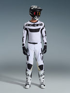 Alpinestars 2026 Racer Riway Gear Set, Motocross Outfit, White and Black, complete racing kit featuring a white jersey with black Alpinestars branding, matching white pants with black accents, black helmet, and white boots, professional off-road racing gear