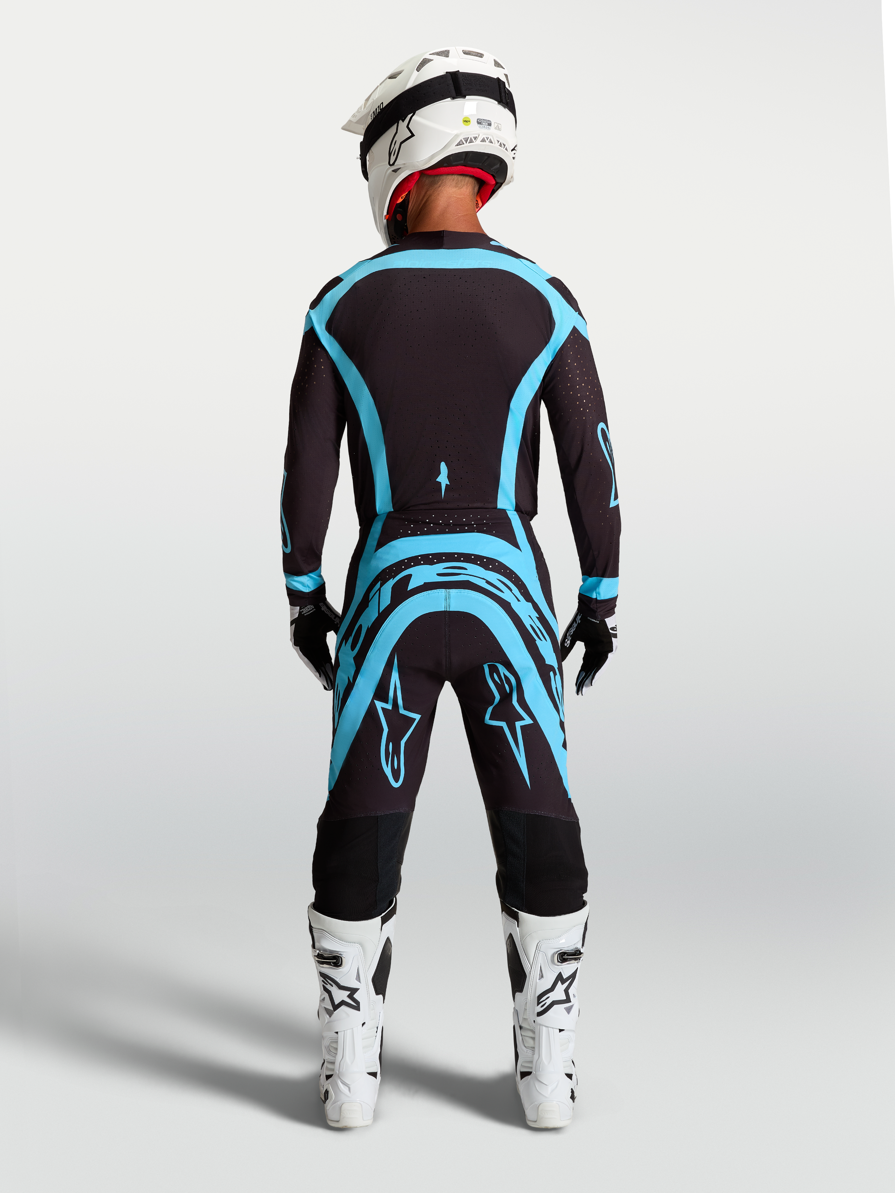 Alpinestars Supertech Vesta Hose in Schwarz und Türkis, Profi-Motocross-Hose mit athletischer Passform.