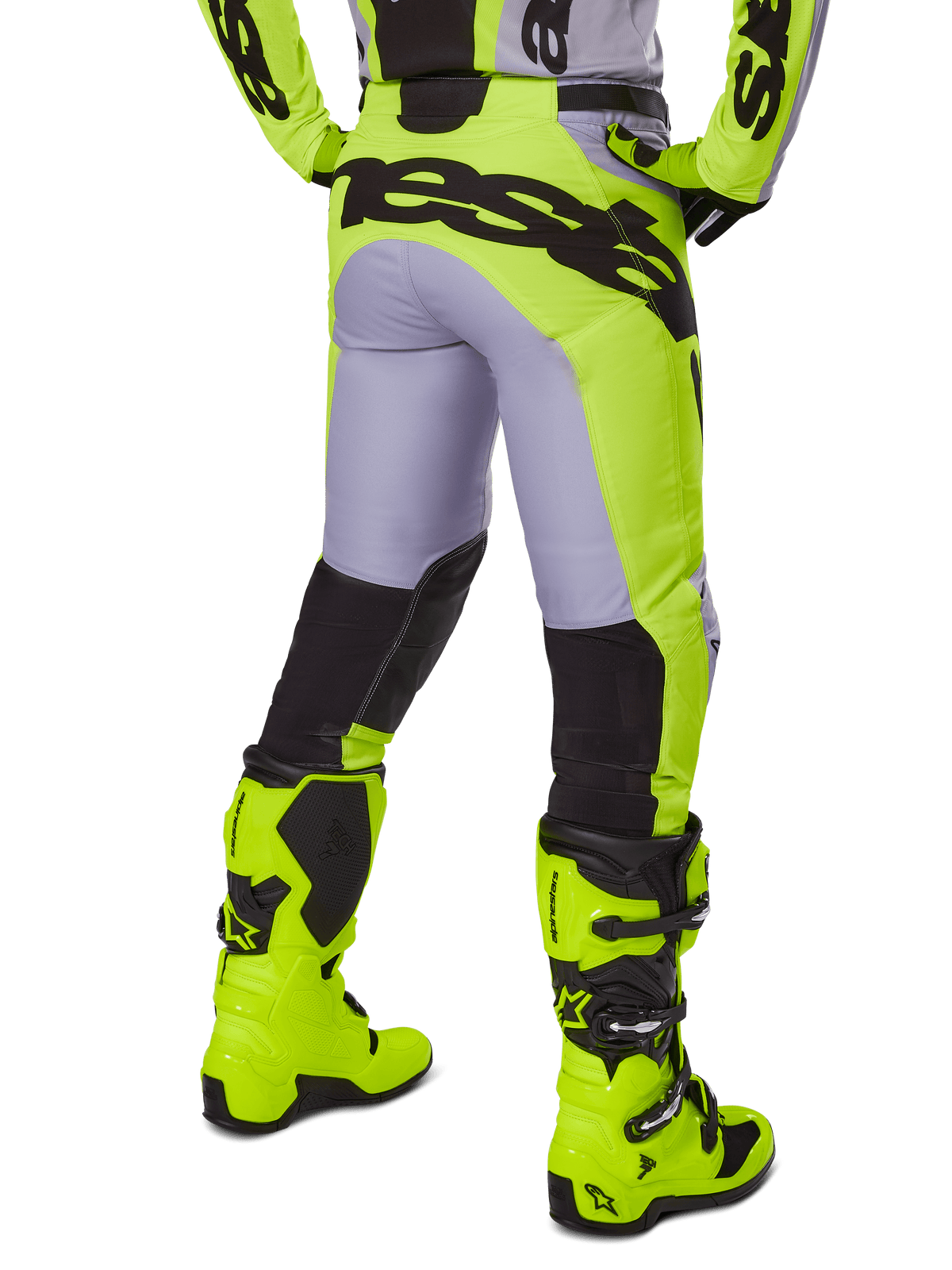 Alpinestars 2025 Racer Veil Hose, Motocross-Hose, Grau und Neongelb, Rückansicht mit ergonomischer Konstruktion, großes schwarzes Branding am Gesäß, schwarze Unterschenkel-Einsätze, passende leuchtend gelbe Rennstiefel.