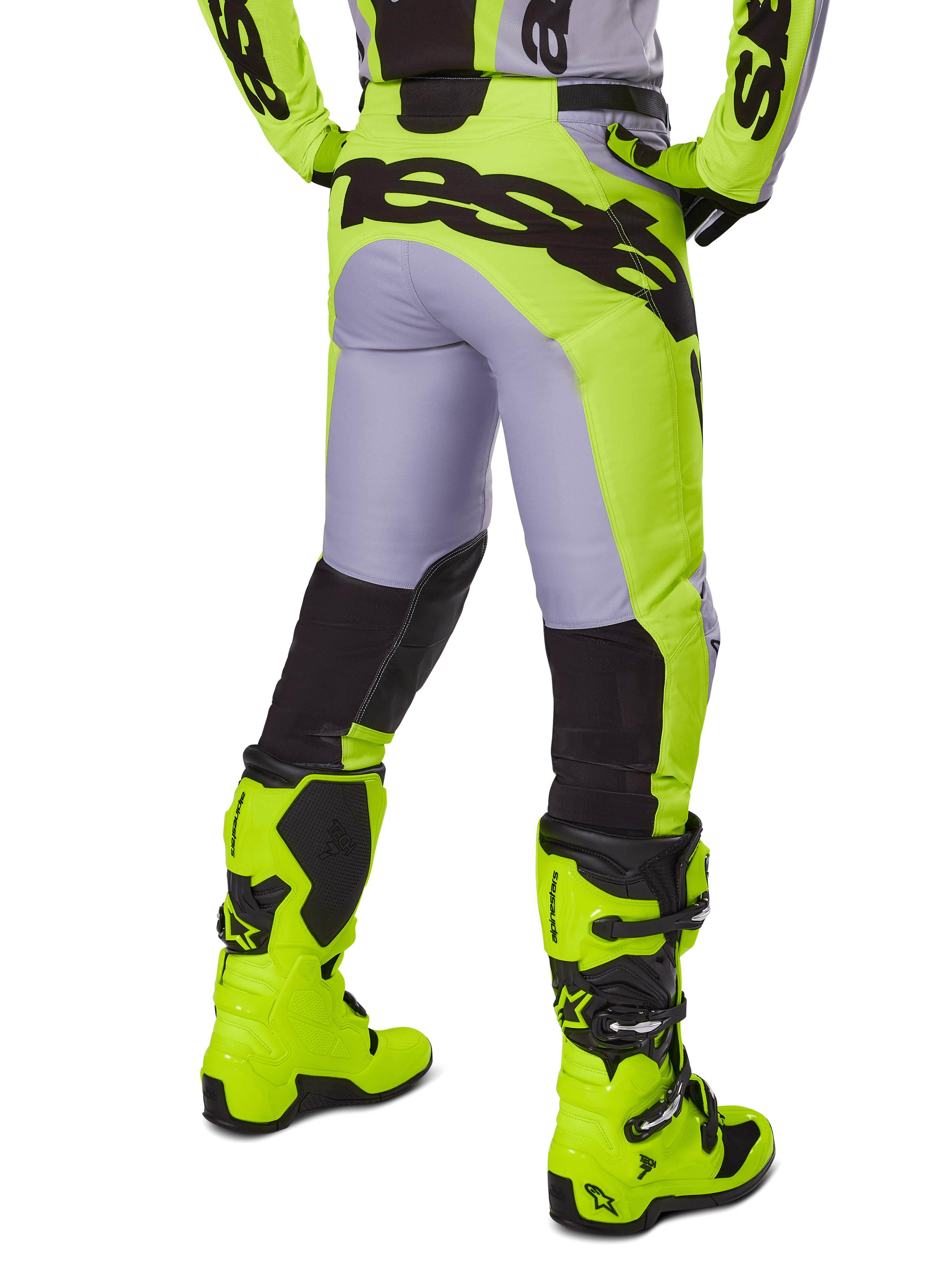 Alpinestars 2025 Racer Veil Hose, Motocross-Hose, Grau und Neongelb, Rückansicht mit ergonomischer Konstruktion, großes schwarzes Branding am Gesäß, schwarze Unterschenkel-Einsätze, passende leuchtend gelbe Rennstiefel.