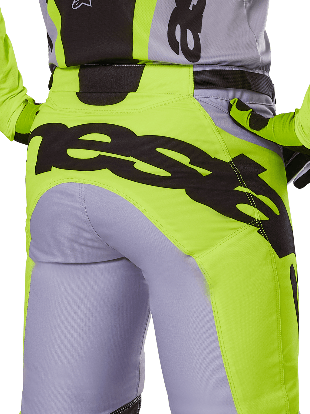 Alpinestars 2025 Racer Veil Hose, Motocross-Hose, Grau und Gelb Fluo, Rückansicht mit großem schwarzen Branding am Gesäß, getragen mit passendem Trikot und Handschuhen, technisches Offroad-Design
