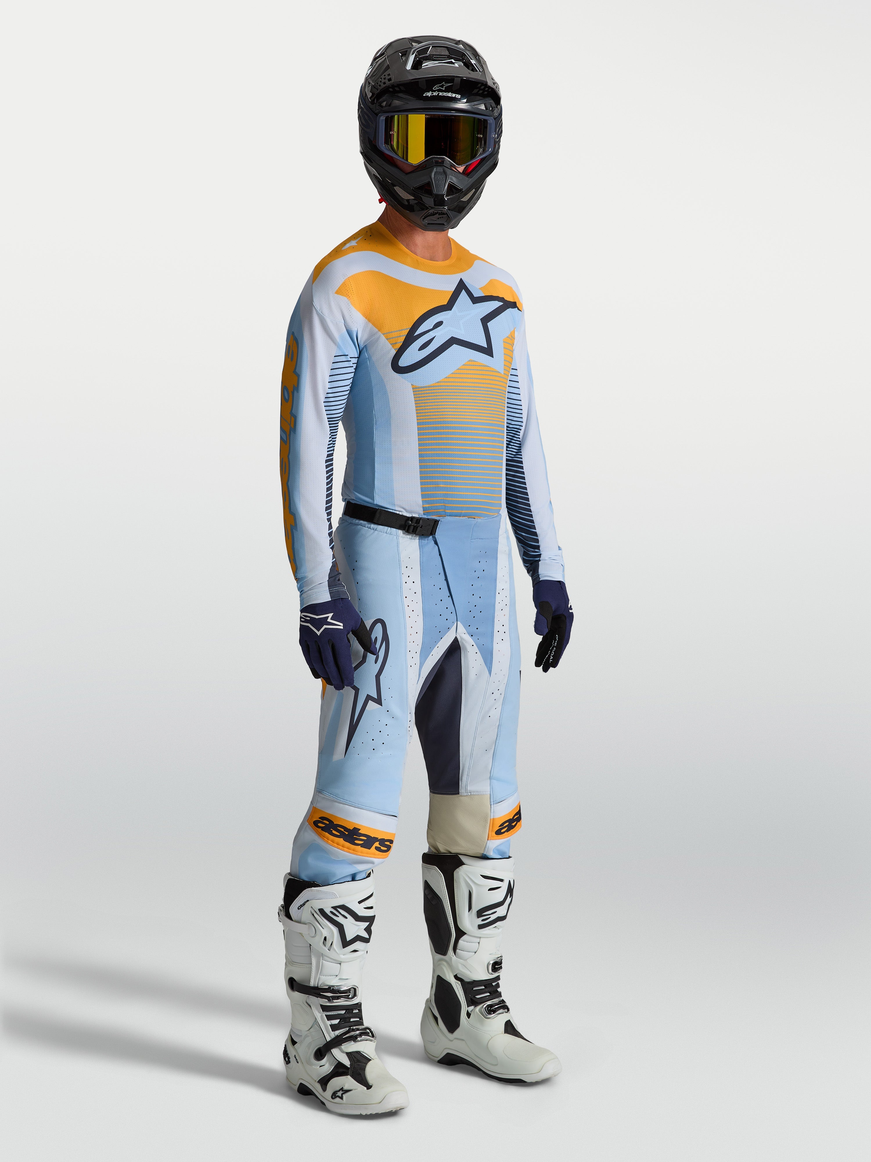 Alpinestars Techstar Maven Hose für Herren, Motocross-Hose in Blau und Orange, athletischer Rennschnitt mit Stretchzonen.