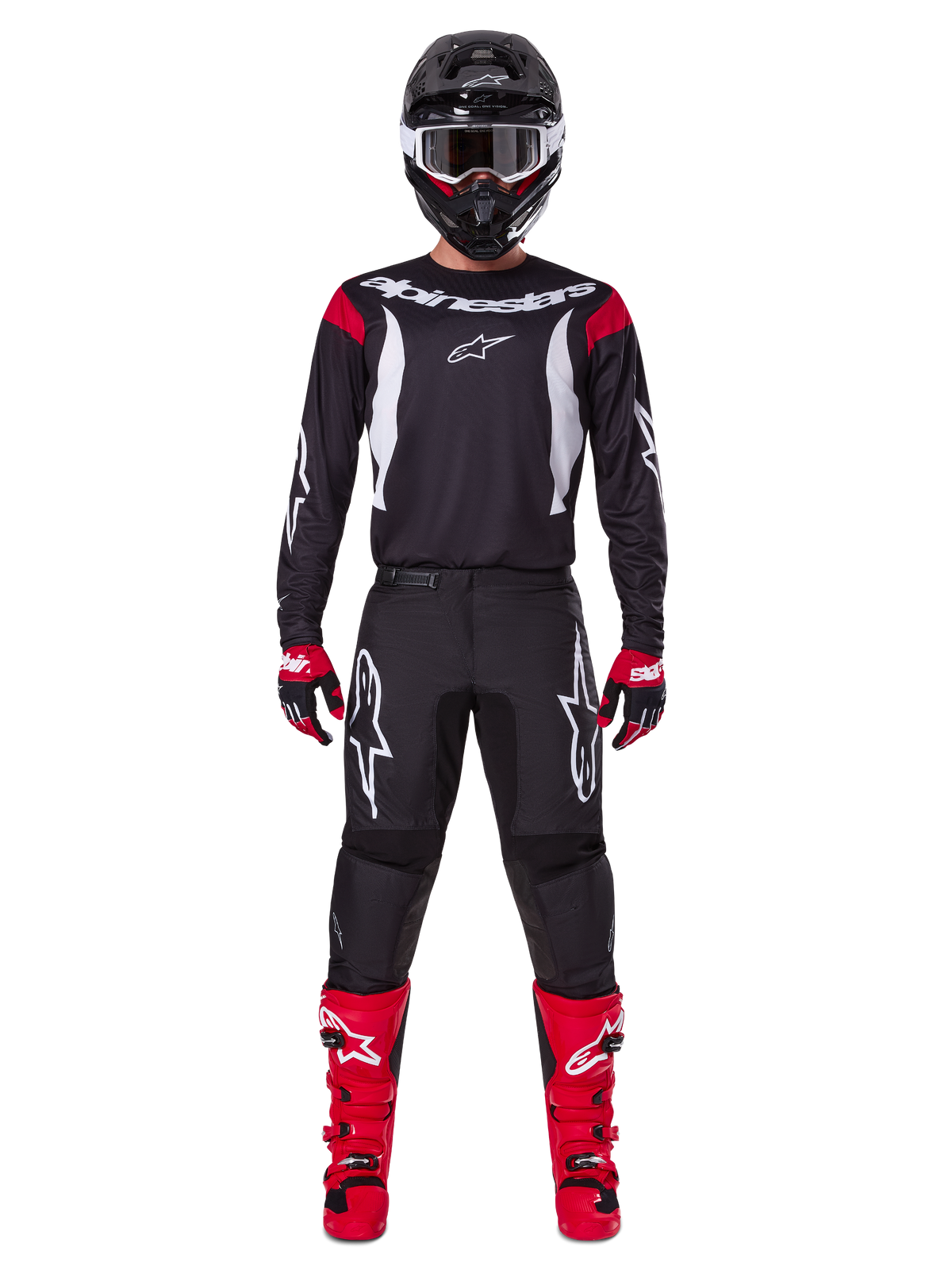 Alpinestars 2025 Fluid Haul Ausrüstungsset, Motocross-Fahrer in kompletter Rennausrüstung, schwarzes Trikot mit roten Schulterakzenten und weißen Logos, schwarze Hose mit weißem Stern-Branding, leuchtend rote Stiefel, rot-schwarze Handschuhe, schwarzer Helm mit weißer Brille, abgestimmter Offroad-Performance-Look