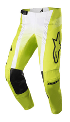 Alpinestars 2023 Techstar Push Pants, Motocross Racing Pants, Yellow Fluo and White with Black accents, featuring black leather inner knee reinforcements, perforated ventilation panels, large black logo on the thigh, and adjustable waist buckle, high-performance off-road gear