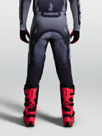 Alpinestars Racer Amber Hose, Herren-Motocrosshose in Grau und Dunkelgrau, strapazierfähiges 600D-Polygewebe, Rückansicht.