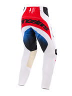 Alpinestars 2026 Techstar Knif Pants, Motocross Pants, White Red and Blue, rear view featuring a large black Alpinestars logo on a red seat panel, blue gradient accents on the thighs, tan leather inner knee panels, athletic racing fit.