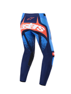Alpinestars 2026 Techstar Nomur Hose, Motocross-Hose, Dunkelblau, Orange und UCLA-Blau, Rückansicht mit einem markanten weißen Astars-Logo auf einem orangefarbenen Einsatz, Mehrpanel-Design mit hellblauen Akzenten, schwarze Knie-Innenpanele, strapazierfähige Ausrüstung für den Offroad-Rennsport.