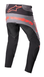 Alpinestars 2023 Techstar Sein Hose, Motocross-Hose, Schwarz und Neonrot, Rückansicht mit grauem Gesäßbereich und großem neonroten Branding, ergonomisch vorgeformte Beine und strapazierfähige Textilkonstruktion für Offroad-Performance.