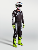 Alpinestars Fluid Apex V2 Hose, Herren-Motocrosshose in Schwarz und Silber, strapazierfähiges Offroad-Material.