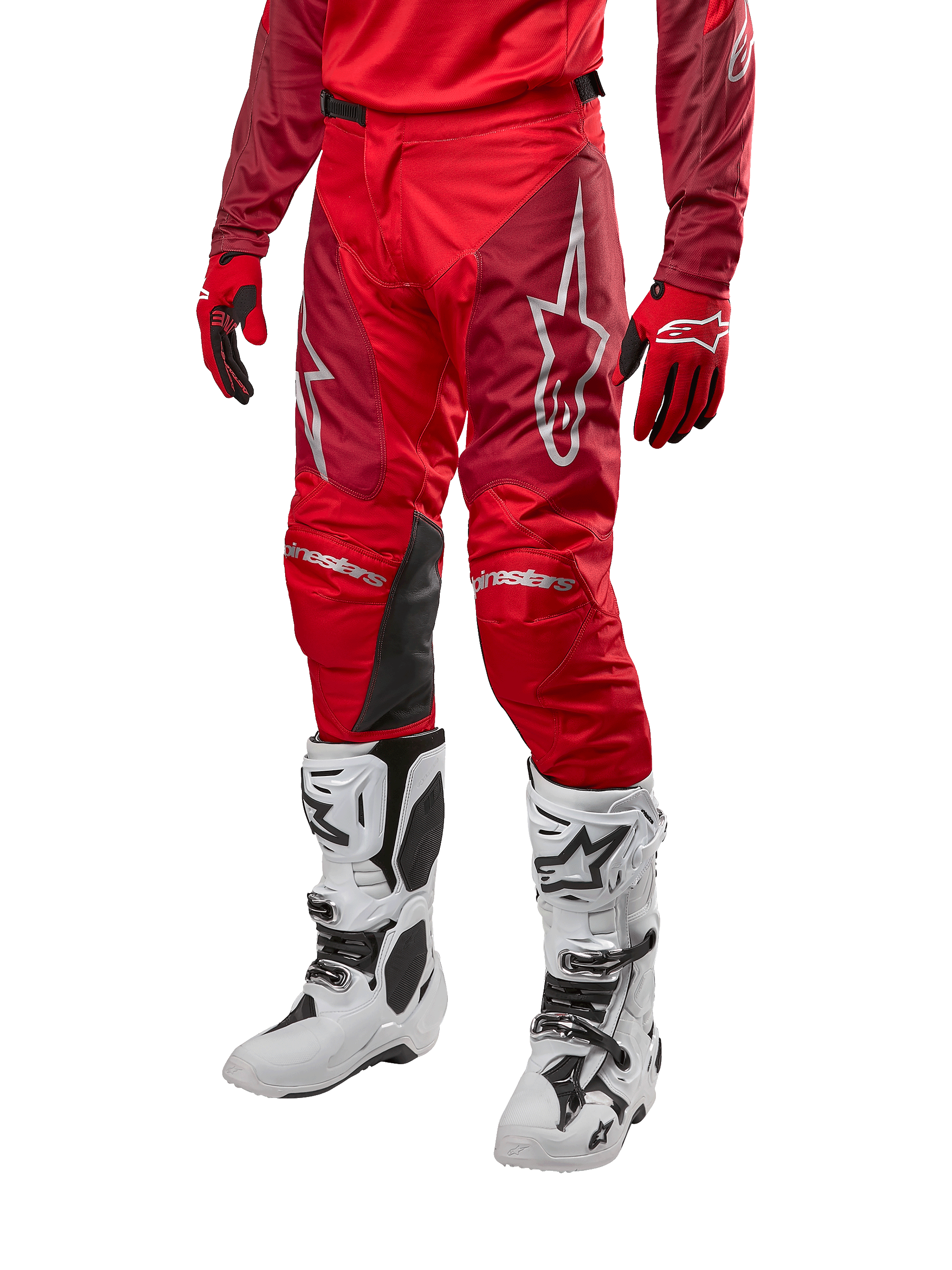 Alpinestars 2024 Racer Hoen Pants, Motocross Pants, Mars Red and Burgundy, worn with matching red jersey and gloves and white boots, featuring black leather knee panels and white logos, durable technical gear for off-road racing