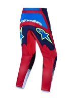 Alpinestars 2027 Fluid Drag Motocross-Hose, Offroad-Motorsport, Rot und Blau, gelbe Grafiken und verstärkte Sitzkonstruktion.