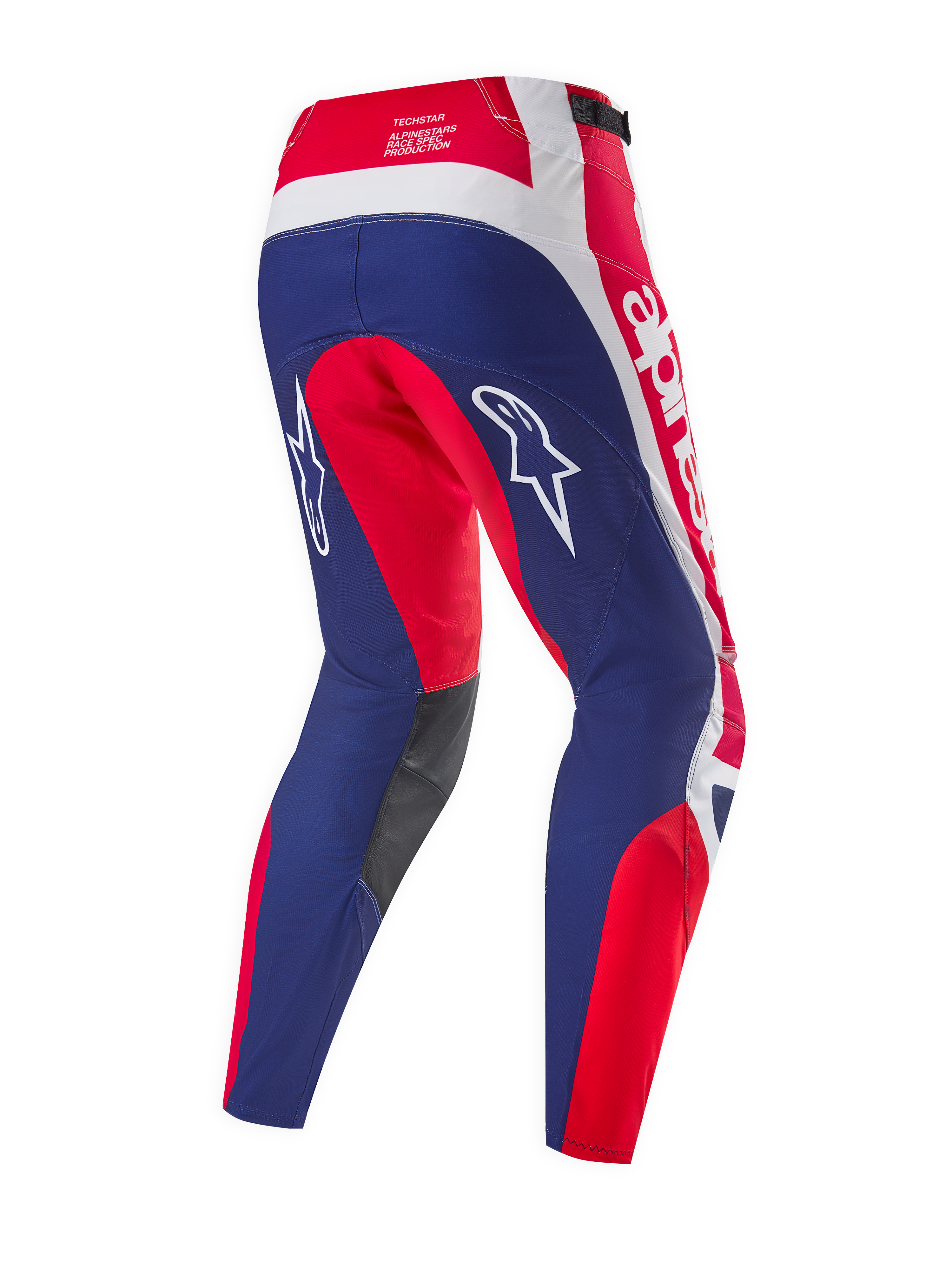 Alpinestars Limited Edition Techstar Fortitude Hose, Motocross-Hose, Hellrot, Weiß und Blau, Rückansicht mit ergonomischen Racing-Panels, weißen Alpinestars-Logos und dunkelgrauen Knieinnenpaneelen.