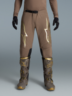 Alpinestars Limited Edition Supertech Air Gold Pants, Men's Brown and Gold Motocross Gear with ventilated rip-stop fabric.