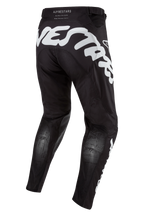 Alpinestars 2024 Racer Hana Hose, Motocross-Hose in Schwarz und Weiß, Rückansicht mit markantem weißem Logo-Schriftzug, atmungsaktive Stretchnet-Zonen an den Waden, ergonomische Offroad-Rennausrüstung