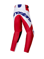 Alpinestars 2025 Youth Racer Veil Pants, Motocross Pants, Bright Red and White, rear view showing a large blue Alpinestars logo on the seat, pre-curved leg design, black inner knee panels, and ratchet waist closure.