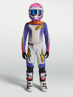 Alpinestars Fluid Drag Jugend-Hose, Motocross-Ausrüstung, Lila und Weiß, goldene Akzente, für junge Offroad-Fahrer.